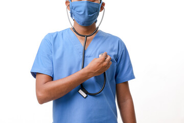 Handsome male doctor standing on white background.