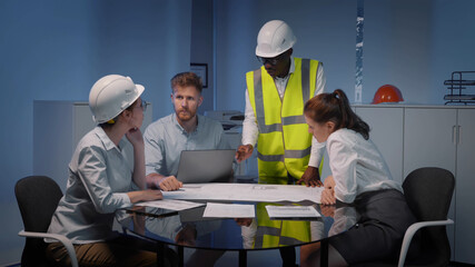 Professional engineer team meeting and working on project at modern office