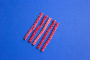 red marmalade on a blue background