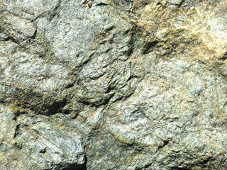 the texture of gray natural stone cobblestone