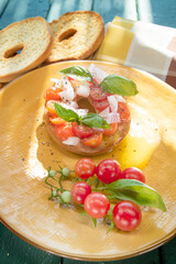 The original Friselle from the Puglia region presented in a yellow plate