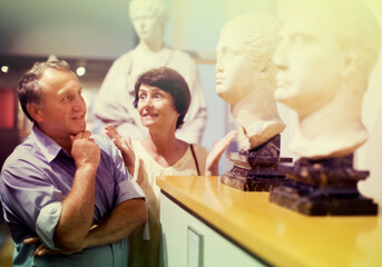 european pensioner family visiting historical exhibition in National Museum