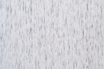 Smooth surface of a white fabric with dark streaks. Fabric background in light tone.