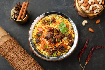 Beef Biryani Mutton biryani , Gosht or lamb biriyani Hyderabadi Dum biriyani with raita yoghurt dip special occasion Indian festival food Ramadan , Eid Hyderabad Kerala India Sri Lanka. Lankan food.	