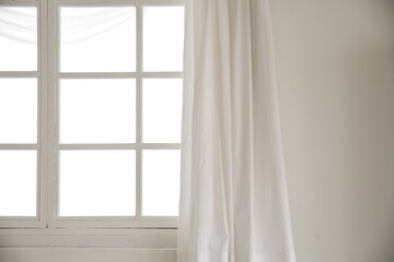 empty room with window and white curtains.