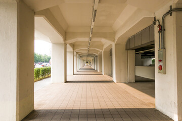 passage consisting of a wall and repeating columns.