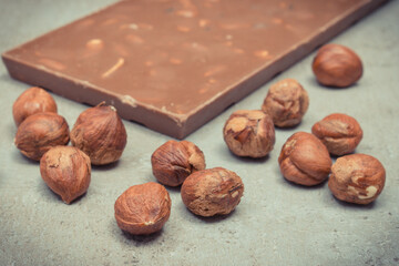 Nutritious chocolate with hazelnuts and raisins. Delicious dessert