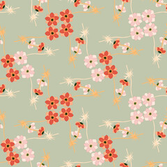 Cute summer style seamless pattern with red and pink little anemone flowers print. Light green background.