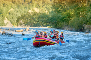 rafting on a stormy mountain river in summer