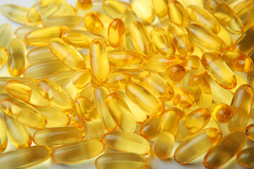 Omega 3 capsules close up. Fish fat. Background 