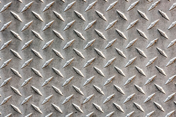 Steel diamond plate background pattern.