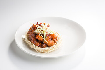 Roasted Beef with sour sweet sauce and noodles isolated on white background