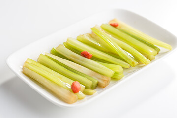 Green fresh celery Sticks sliced with soy sauce isolated on white background