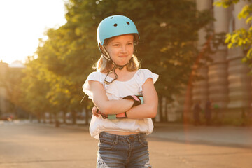 Young rollerblader girl looks angry with her arms crossed