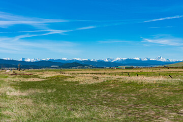Landscape of the Flint Cheek Valley in Montana with the Snow-Capped Anaconda Mountain Range in the Background