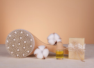 SPA. Relax. Body brush, handmade soap and aroma oil on light background
