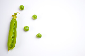 Green peas on a white background, your dietary lifestyle.