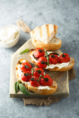 Tomato bruschetta with cream cheese and sage