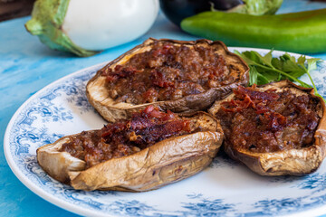 Aubergines stuffed with minced meat with serrano ham, baked in the oven