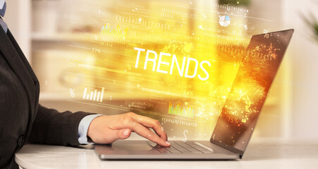 Closeup of businessman hands working on laptop