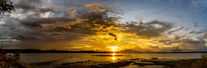 atmosphere, sky, and water surface after sunset above river