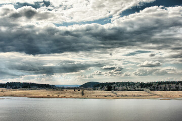 Obraz premium clouds over the river