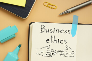 Business ethics is shown on the conceptual photo using the text