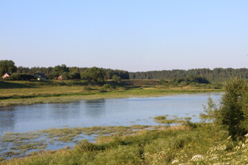 summer river in the countryside in the evening