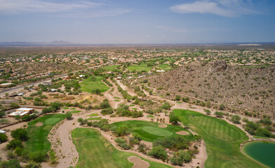 Fototapeta premium A high definition aerial view of a golf course located in the southwestern United States.