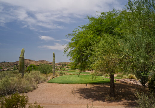 A high definition aerial view of a golf course located in the southwestern United States.