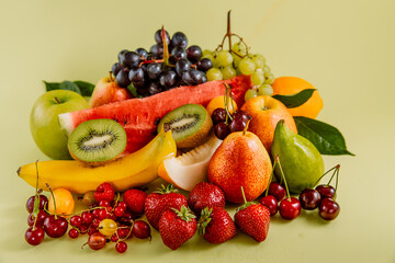 a mix of ripe fruits on a light background 