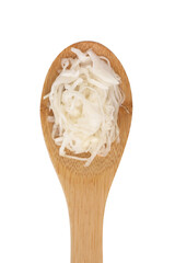 Sauerkraut on a white background. Pickled cabbage close-up in a spoon on a white background.