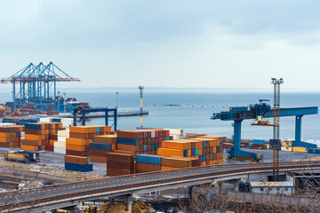 Stacked cargo containers in storage area of freight sea port