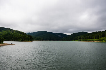 Bolboci Lake or "sea from Bucegi", artificial dam lake in the Bucegi massif, on the Ialomita river. Romania.