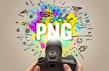 Close-up of a hand holding digital camera with abstract drawing