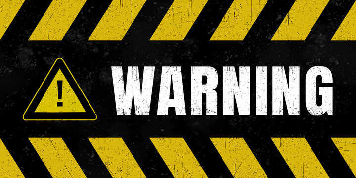 Grungy sign with term „warning“ on it.