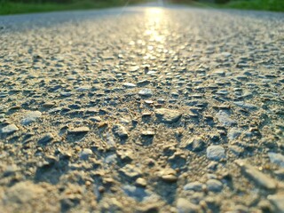 Automobile road close-up. Concrete road made of stones. Close-up track.
