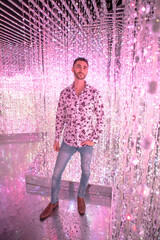 Man dressed up modeling in unique setting
