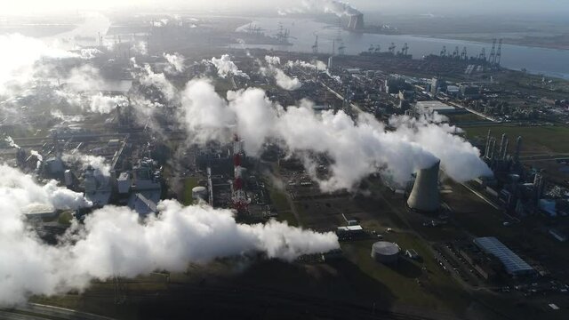 High altitude aerial view of nuclear plant presently the vast majority of electricity from atomic power is produced by fission of uranium and plutonium in power-stations 4k quality resolution