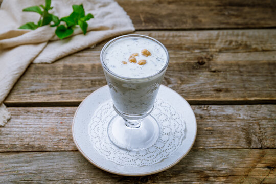 dovga drink on glass on wooden table