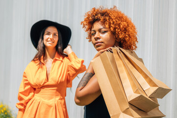 portrait of girls with shopping bags