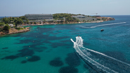 Aerial drone photo of famous celebrity sandy beach of Astir or Asteras in south Athens riviera with...