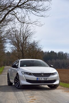 Peugeot 508 SW PHEV. Plug-in hybrid car on a country road. General view. 04-11-2021, Middle Bohemia, Czech Republic.