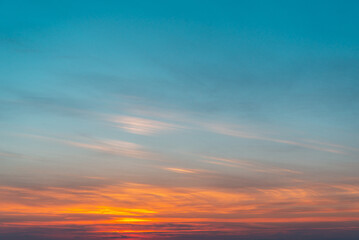 Pink sunset in the turquoise sky.