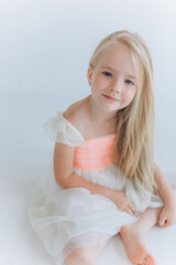 Obraz na płótnie Canvas Blondie cute beauty little girl on white background