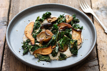 White bean puree with crispy kale and mushrooms