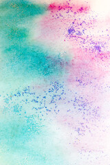 Pink-green watercolor stains with sparkles. Abstract background