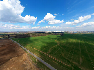 Aerial view of agricultural landscape with fields in spring season