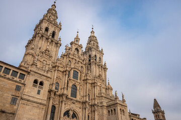Fototapeta na wymiar The Santiago way. Facade of the Obradoiro, main entrance of the cathedral of Santiago de Compostela.