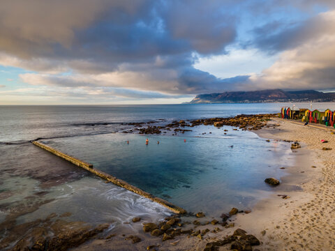Aerial view of St James tidal pool in summertime, Cape Town, South Africa.
